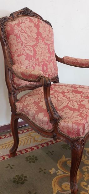 Flat-backed armchair in moulded and carved...