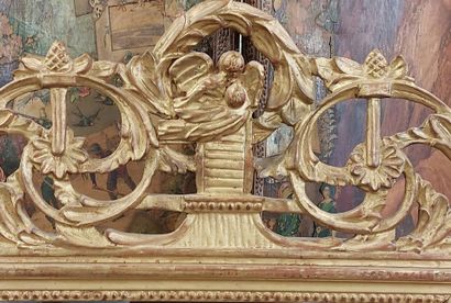 Wood and gilded stucco MIRROR, openwork pediment...