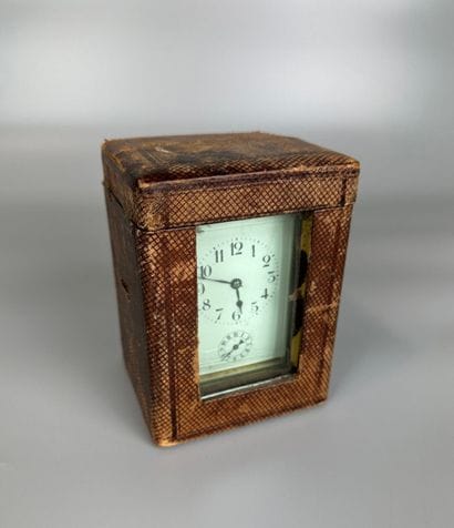 Brass OFFICER'S CLOCK with glass cages. Enameled...