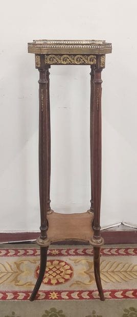 Mahogany veneered SELLETTE with gilded bronzes,...