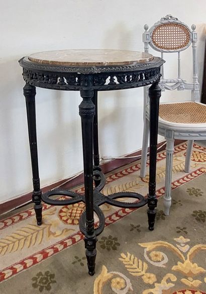 Blackened wooden GUERIDON, openwork outline,...