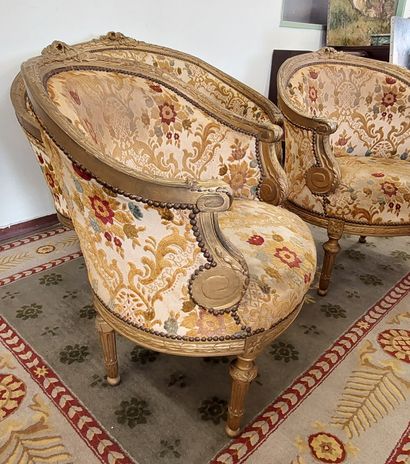 Gilded wood salon with floral fabric upholstery,...