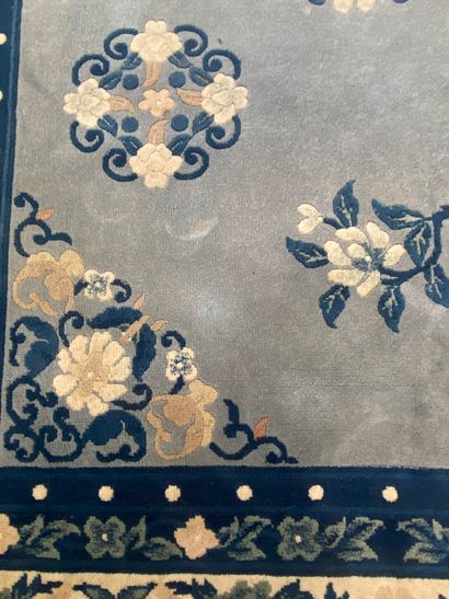 TWO RUGS

- handmade wool carpet with flower...