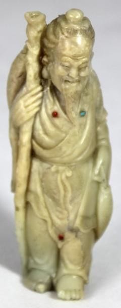 CHINE
FIGURE en pierre de lard représentant...