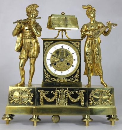 PENDULE en bronze doré et ciselé à décor...