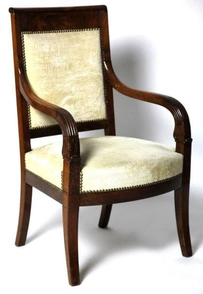 FAUTEUIL en acajou et placage d'acajou, les...