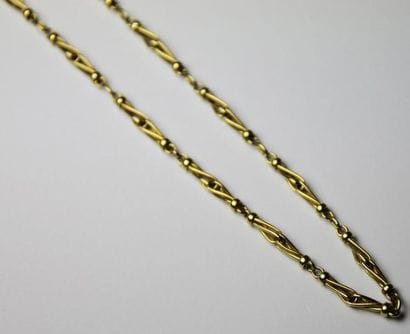 LONG SAUTOIR en or jaune. Poids brut: 45,4...