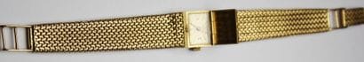 BRACELET MONTRE en or jaune. Poids brut:...