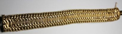 BRACELET manchette en or jaune brossé et...