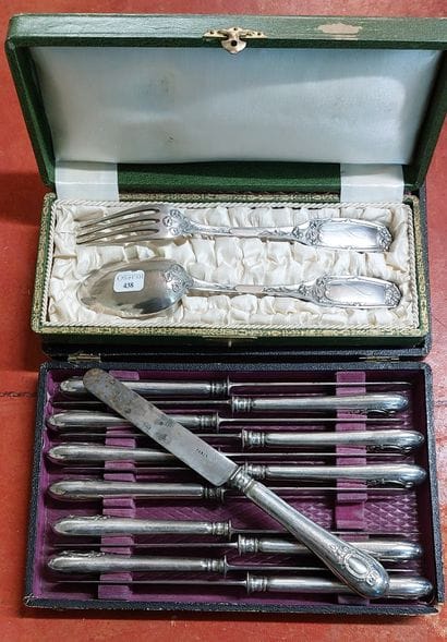TWELVE DESSERT KNIVES, silver handles with...