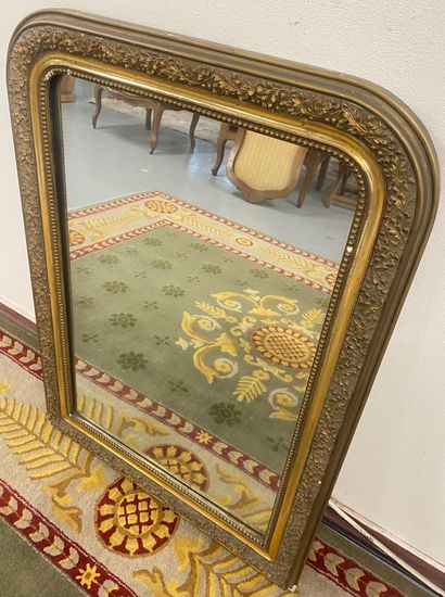 Wood and gilded stucco MIRROR decorated with...