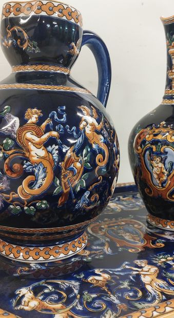 GIEN

A tray and two pourers in Gien earthenware...