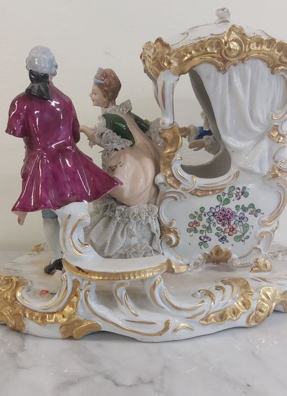 GERMANY

Polychrome and gilded porcelain...