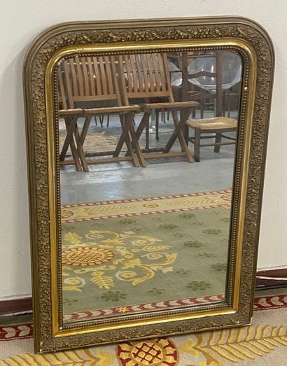 Wood and gilded stucco MIRROR decorated with...