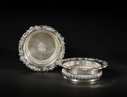Pair of circular silver coasters,
The rounded...