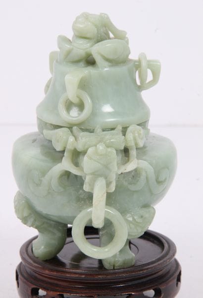 CHINA, 20th CENTURY
Serpentine-covered tripod...