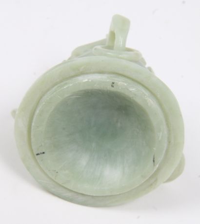 CHINA, 20th CENTURY
Serpentine-covered tripod...