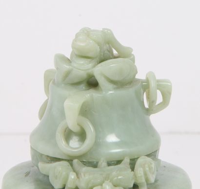 CHINA, 20th CENTURY
Serpentine-covered tripod...