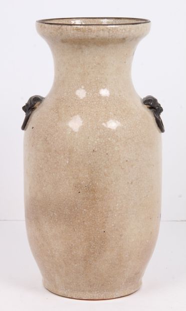 CHINA, CIRCA 1900
A beige glazed stoneware...