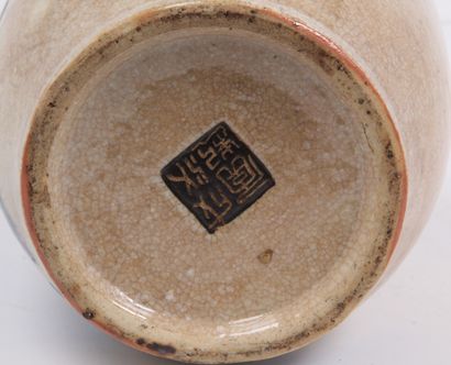 CHINA, CIRCA 1900
A beige glazed stoneware...