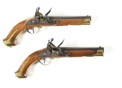 Paire de pistolets à silex
pour le tir.
Canons...