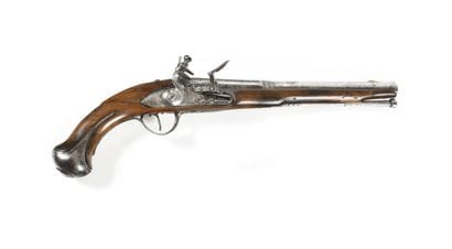 Pistolet d’arçon à silex.
Canon rond à pans,...