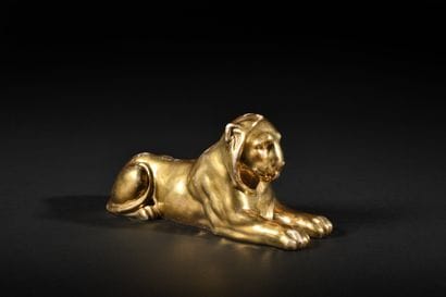 Paris
Reclining lioness in gold-ground porcelain.
Engraved...