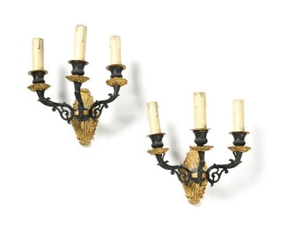 Pair of sconces
in patinated bronze and gilt...