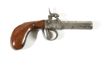 Pistolet à coffre à percussion.
Canon à pans....