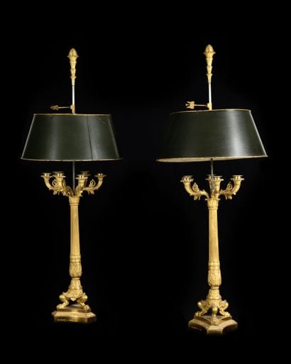 Pair of six-light gilt bronze
in gilded bronze...