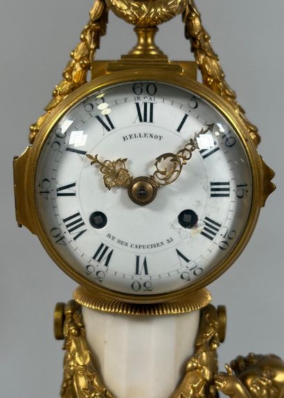 A white marble and gilt-bronze CHIMNEY CLOCK...
