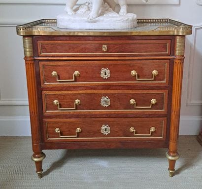 A mahogany and mahogany veneer INTERDEUX...