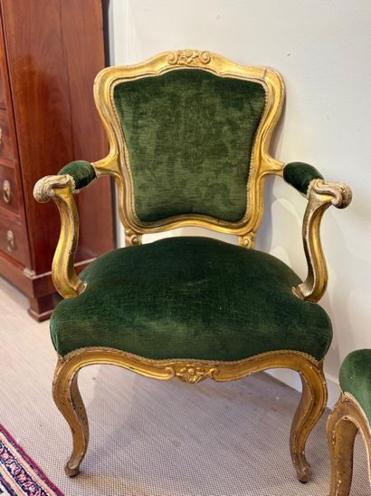 PAIR OF WHEELCHAIRS in molded and gilded...