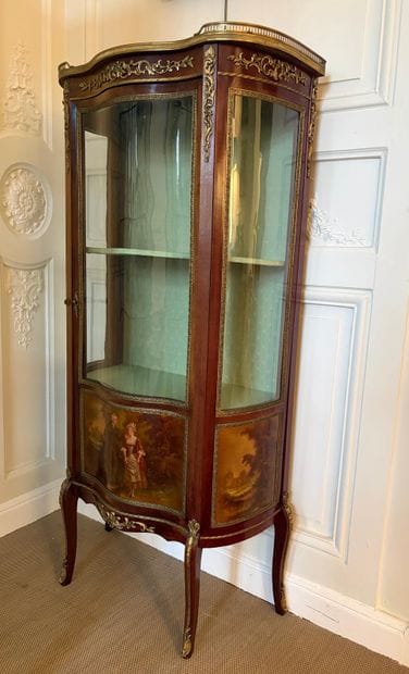 A veneered wood VITRIN with curved front...