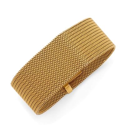 BRACELET 
présentant une maille tressée....