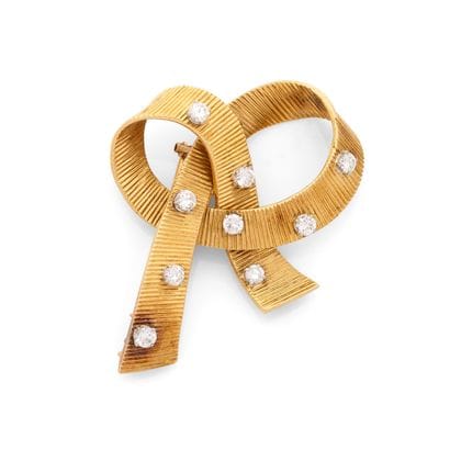 BOUCHERON
BROCHE
présentant un motif de ruban...