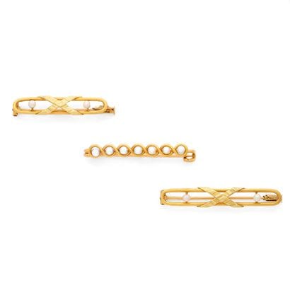 SET OF 3 LAPEL PINS
including one featuring...