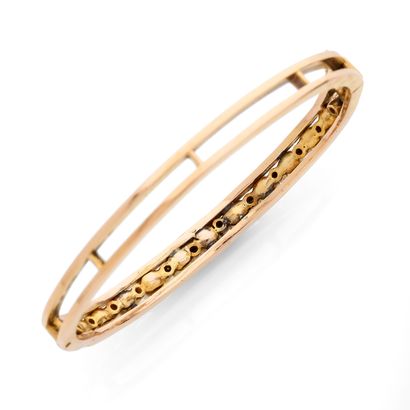 BANGLE BRACELET 
Oval-shaped, featuring a...