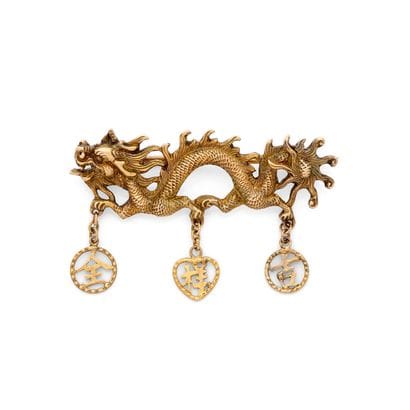 BROCHE 
présentant un motif de dragon chinois...