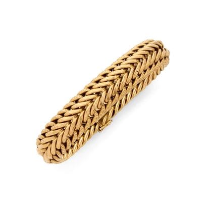 BRACELET
retenant une maille américaine partiellement...