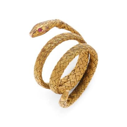 XIXth CENTURY
RING 
holding a coiled snake...