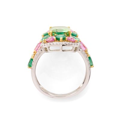 BAGUE 
retenant en son centre une tourmaline...