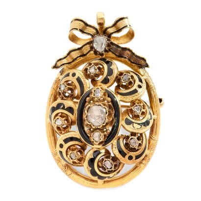 19TH CENTURY
PENDANT BROOCH 
featuring an...