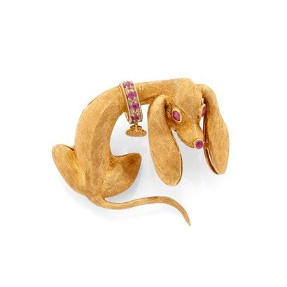BROCHE
présentant un motif de teckel en or...