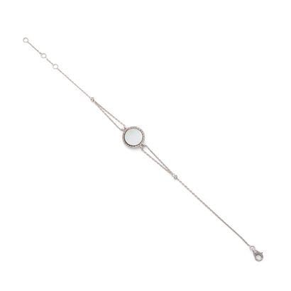 BRACELET
retenant un disque de nacre dans...