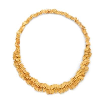 COLLIER 
ras de cou au décor asymétrique...