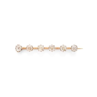 BROCHE BARETTE
retenant 6 diamants taille...