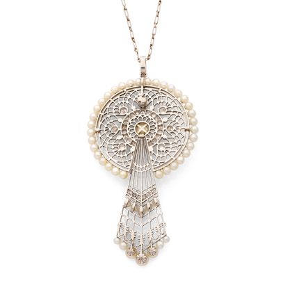 PENDENTIF À TRANSFORMATION
présentant un...
