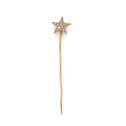 TIE PIN 
featuring a star motif set with...