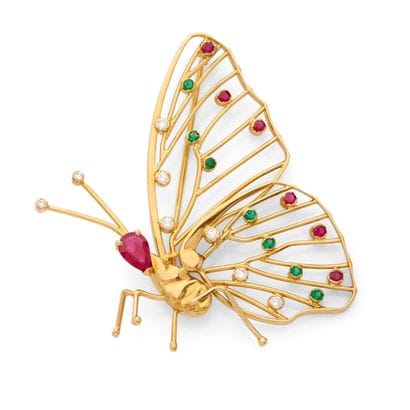 BROCHE 
présentant un motif de papillon ponctué...
